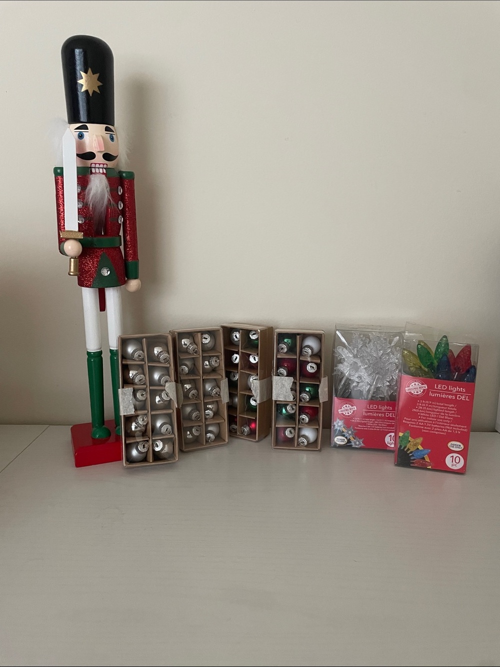 Festive Red & Green Nutcracker Holiday Figurine with Assorted mini Ornaments